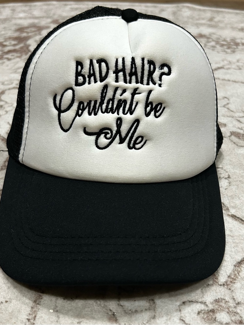 Black & White 'Bad Hair? Couldn't Be Me' Trucker Hat